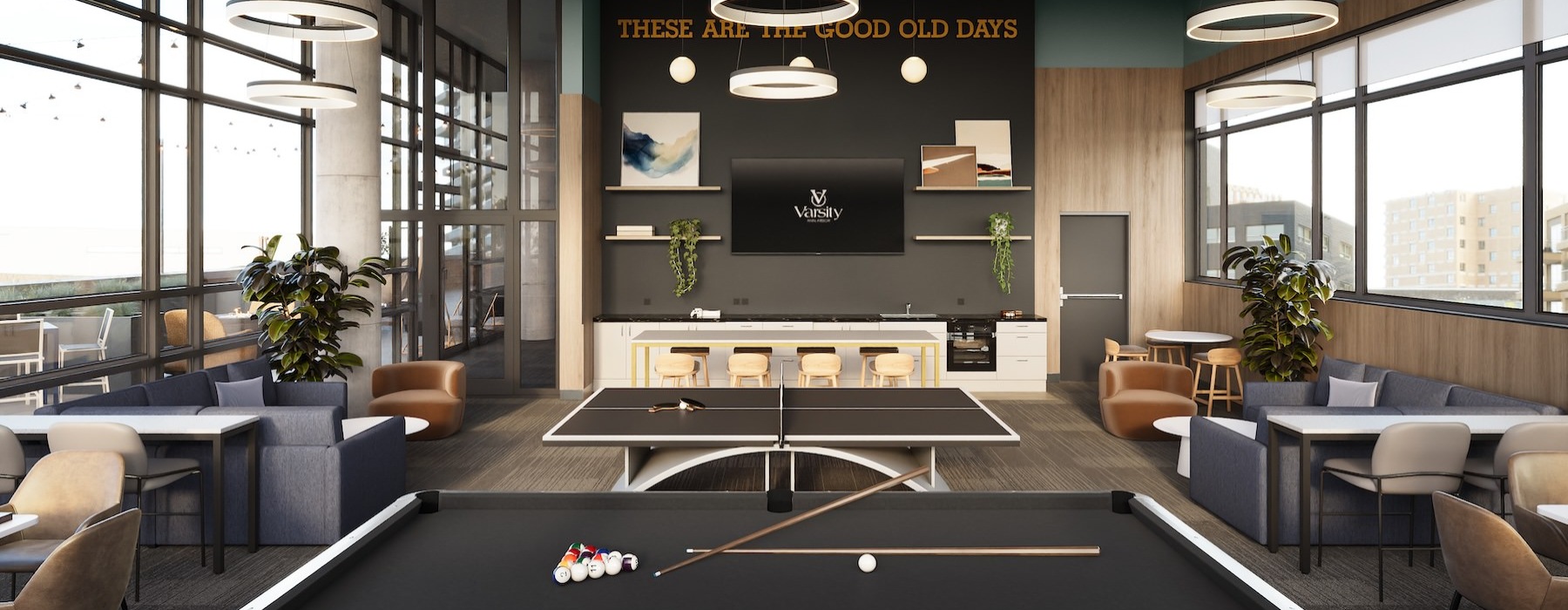 a clubroom with a pool table, tables and chairs