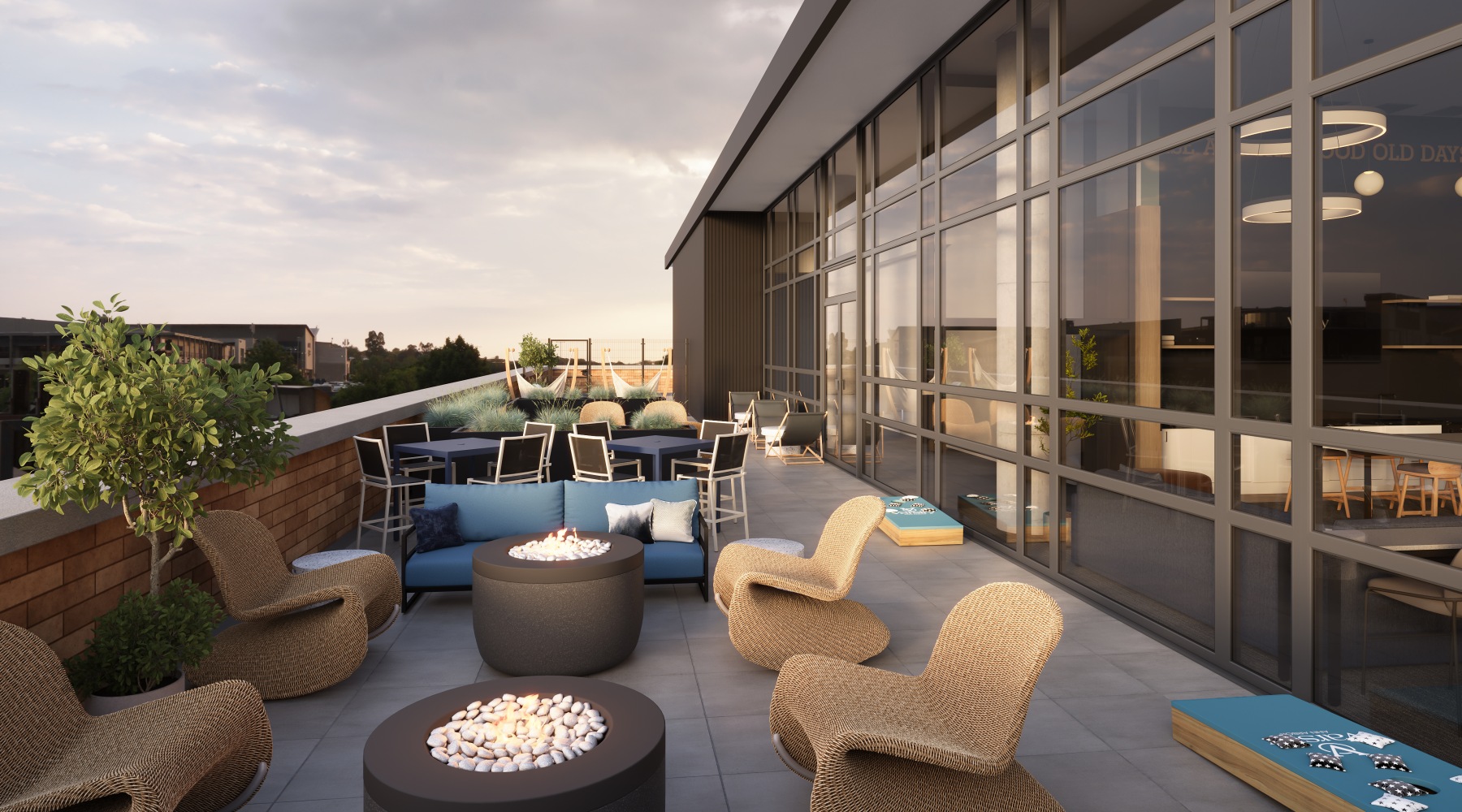 a patio area with tables, chairs and couches